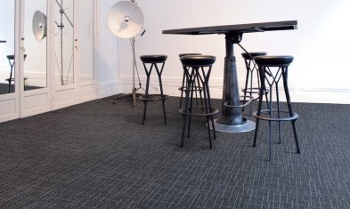 What is the office market and how much carpet tile is sold in relation to roll carpets?